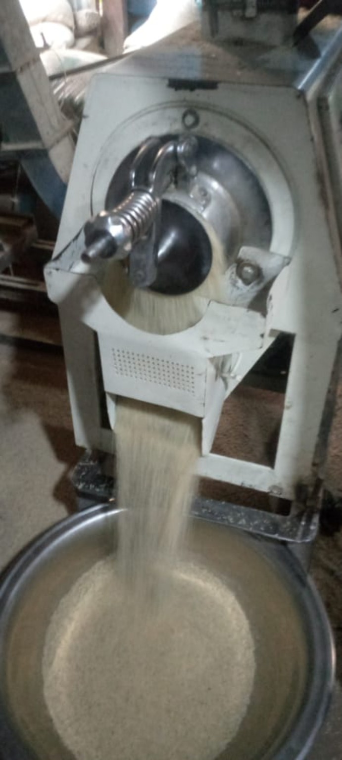 Rice milling machine in operation